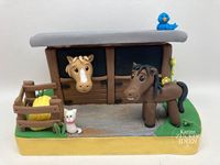 pferdestall aus keksen mit pferdenaus fondant dekoriert